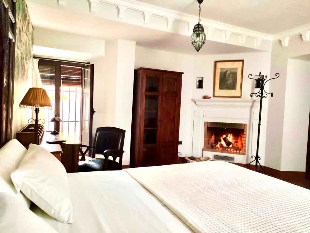 Cama o camas de una habitación en El Rincón de las Descalzas