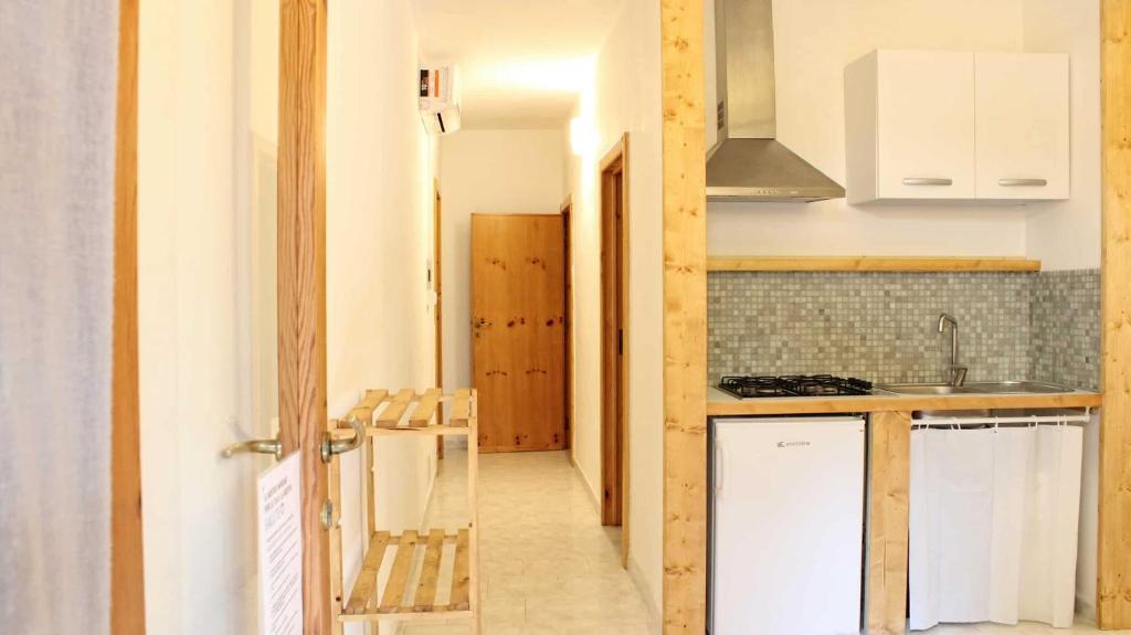 Kuchyň nebo kuchyňský kout v ubytování Villaggio Camping Sentinella