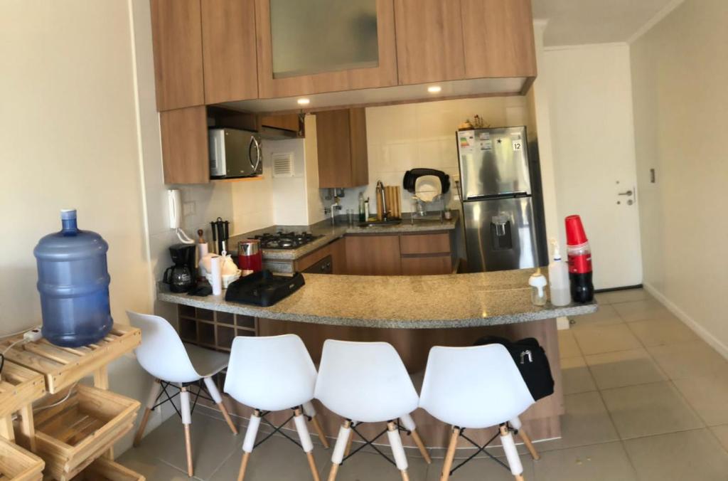 Kuchyň nebo kuchyňský kout v ubytování Departamento en El Tabo sin sabanas ni toallas mas IVA