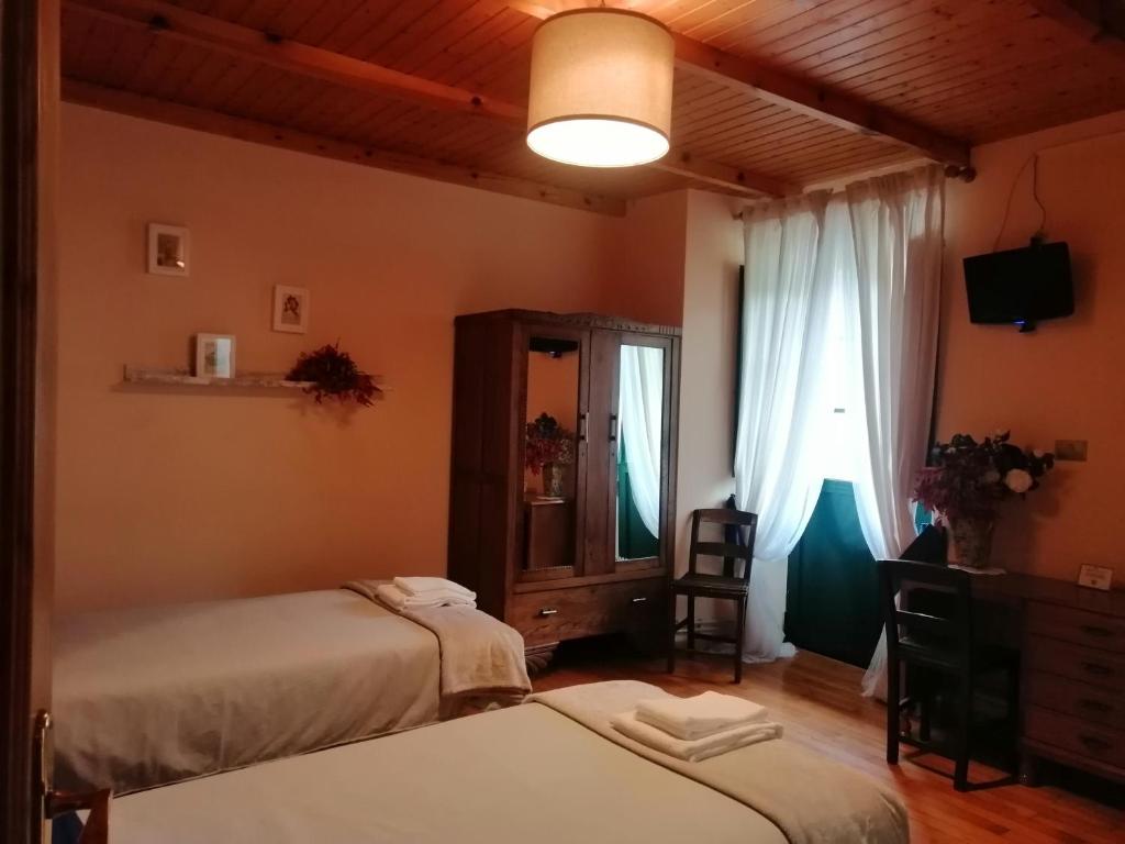 Postel nebo postele na pokoji v ubytování Casa Licerio