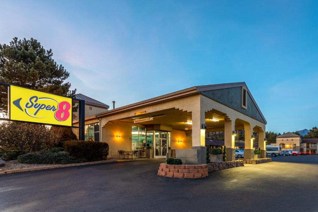 a store with a super sign in front of it at Super 8 by Wyndham NAU/Downtown Conference Center in Flagstaff