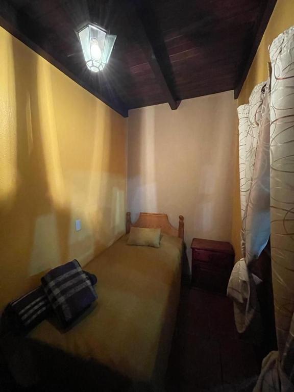 Postel nebo postele na pokoji v ubytování Villas Lupita