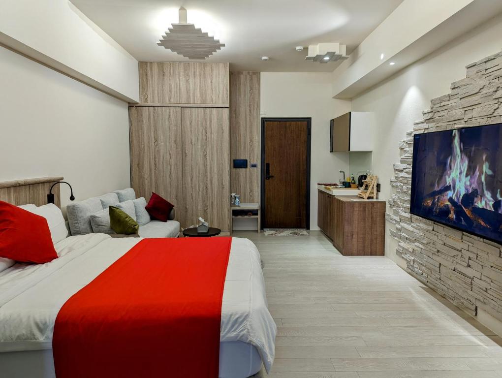 Postel nebo postele na pokoji v ubytování 溫朵莉 Wendoly's Hot Spring Suite