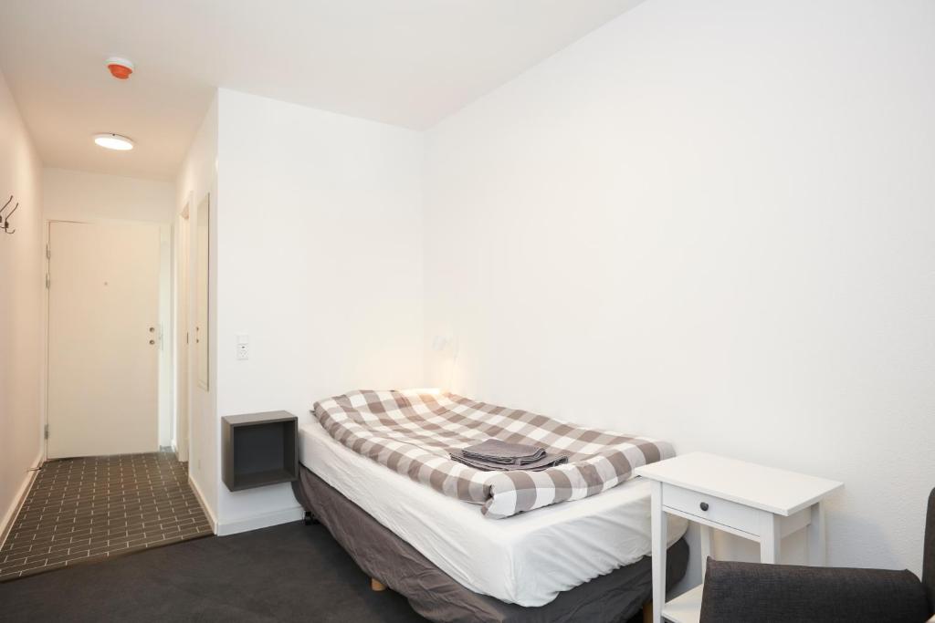 Postel nebo postele na pokoji v ubytování Hotel Osted