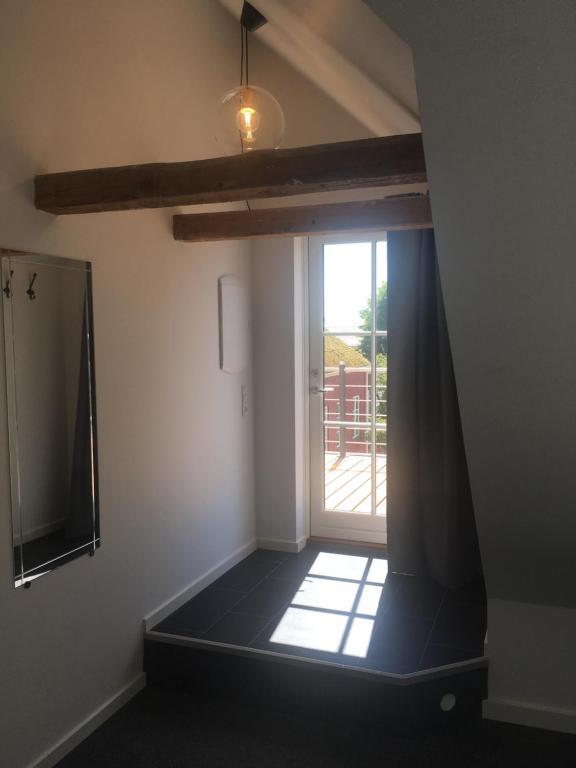 Postel nebo postele na pokoji v ubytování Hotel Osted