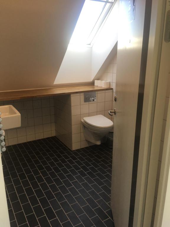 Koupelna v ubytování Hotel Osted