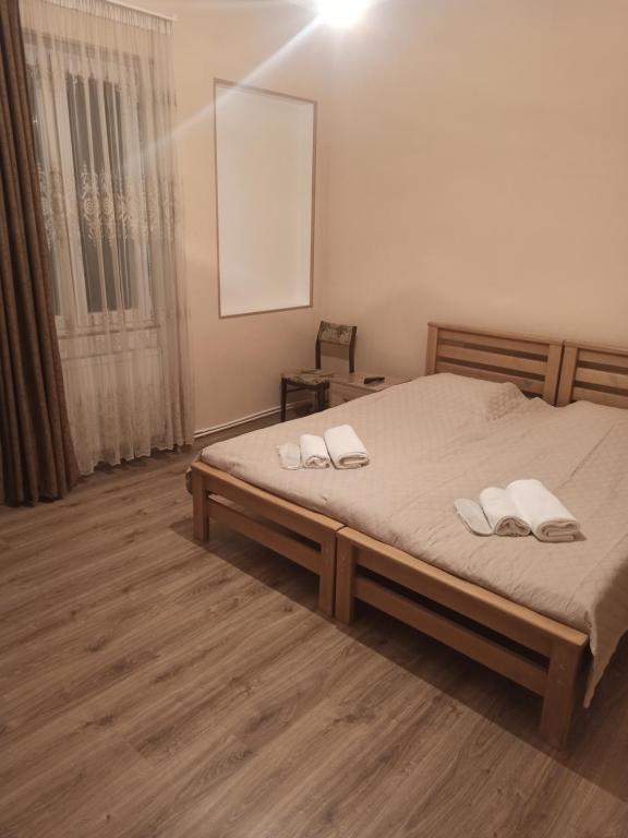 Postel nebo postele na pokoji v ubytování Bal's House