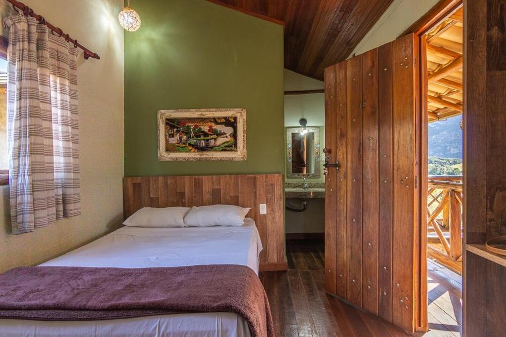 Cama ou camas em um quarto em Pousada Lapralapa