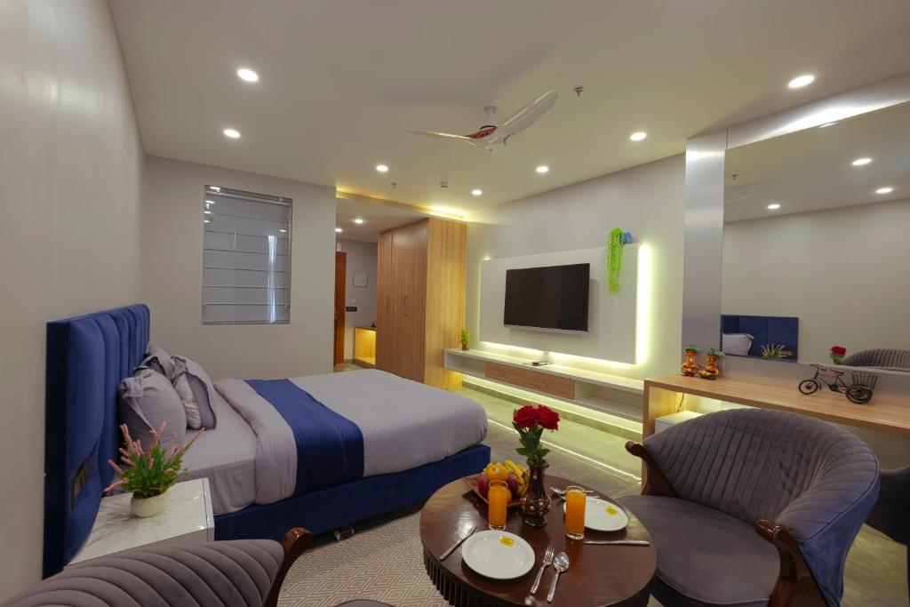 TV a/nebo společenská místnost v ubytování Hotel Bay Laurel Retreat