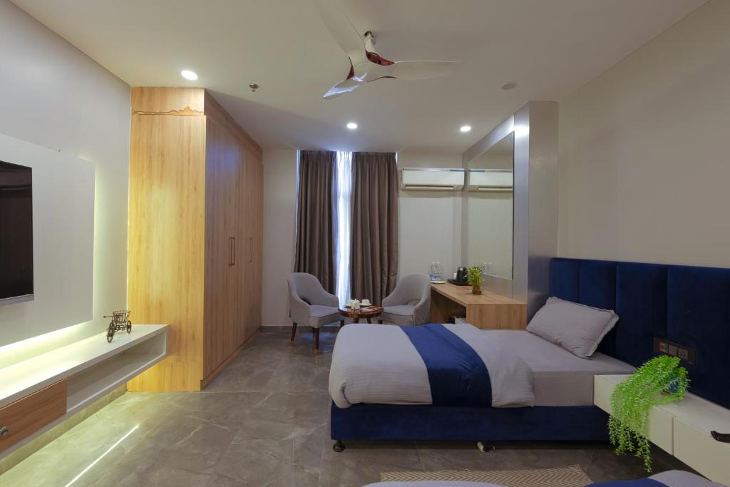TV a/nebo společenská místnost v ubytování Hotel Bay Laurel Retreat