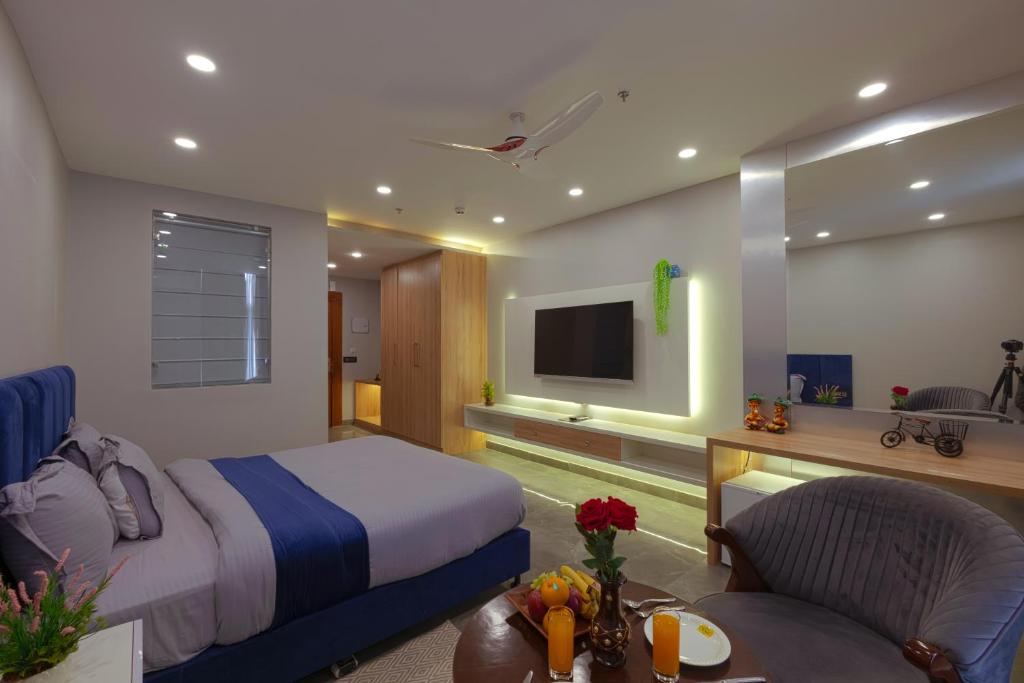 TV a/nebo společenská místnost v ubytování Hotel Bay Laurel Retreat