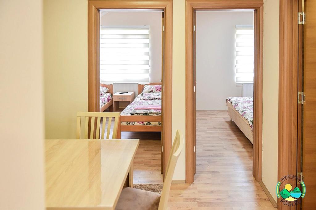 Postel nebo postele na pokoji v ubytování Apartman Pogled Arilje