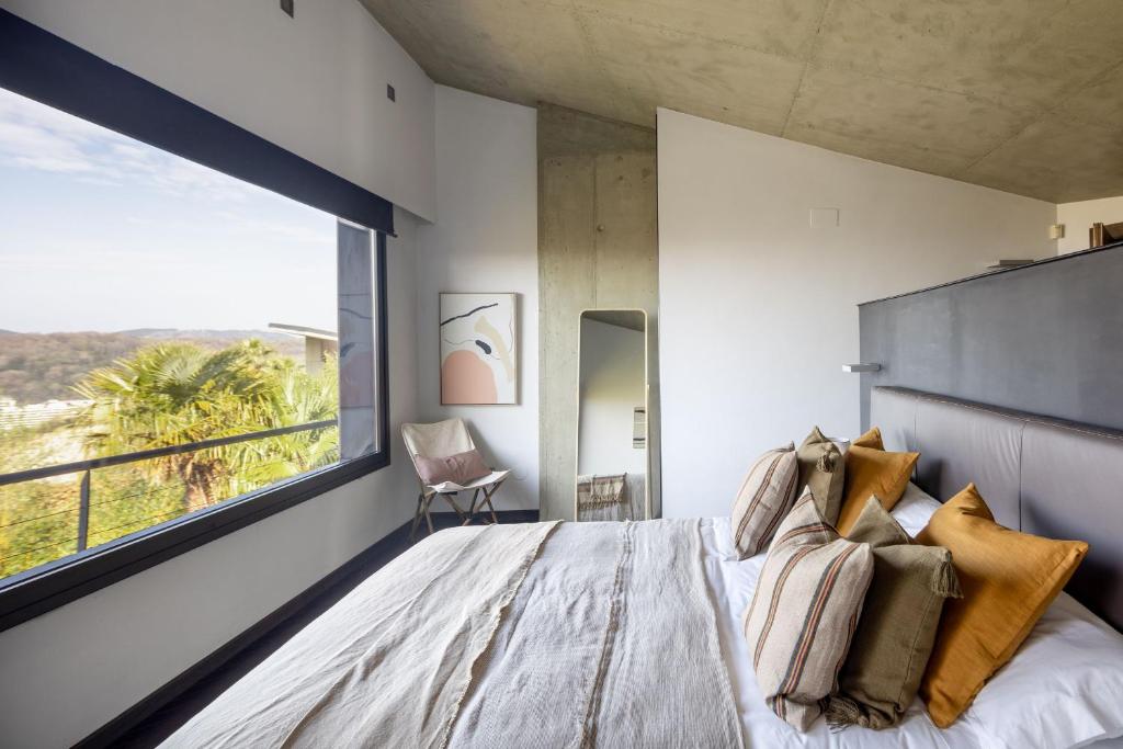 Posteľ alebo postele v izbe v ubytovaní Amazing Villa in San Sebastián by SanSe Holidays