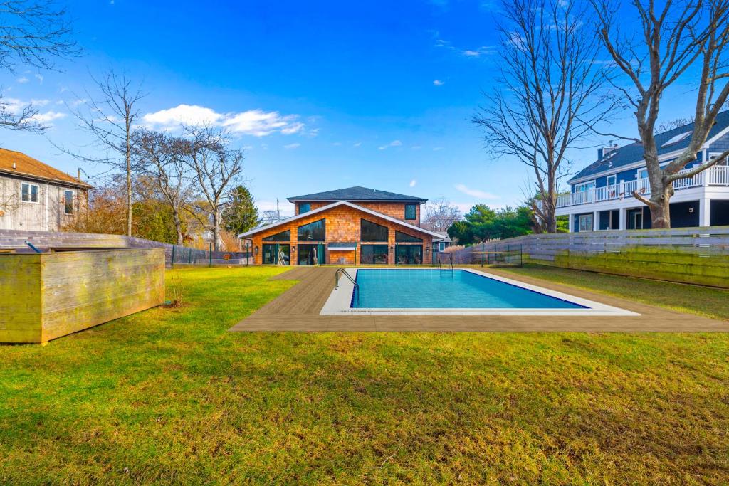 a swimming pool in the yard of a house at La Sirena in Montauk
