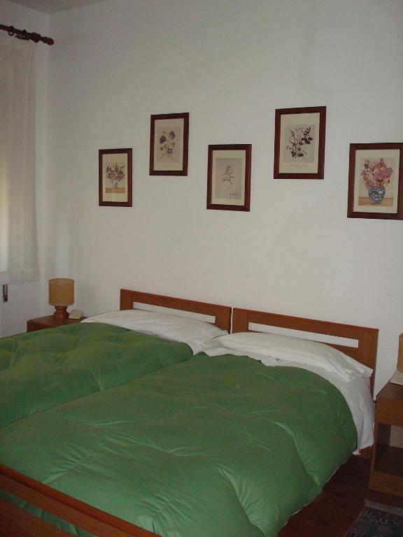 Postel nebo postele na pokoji v ubytování Albergo La Sfinge