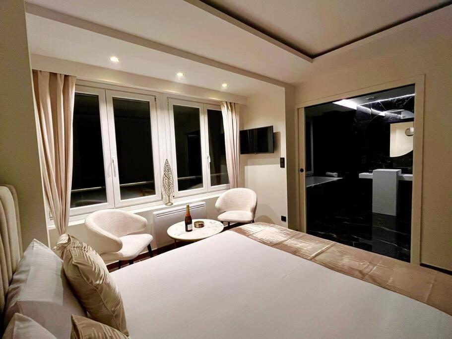 Posteľ alebo postele v izbe v ubytovaní La Suite Luxe : Vue Mer - Malo'cation