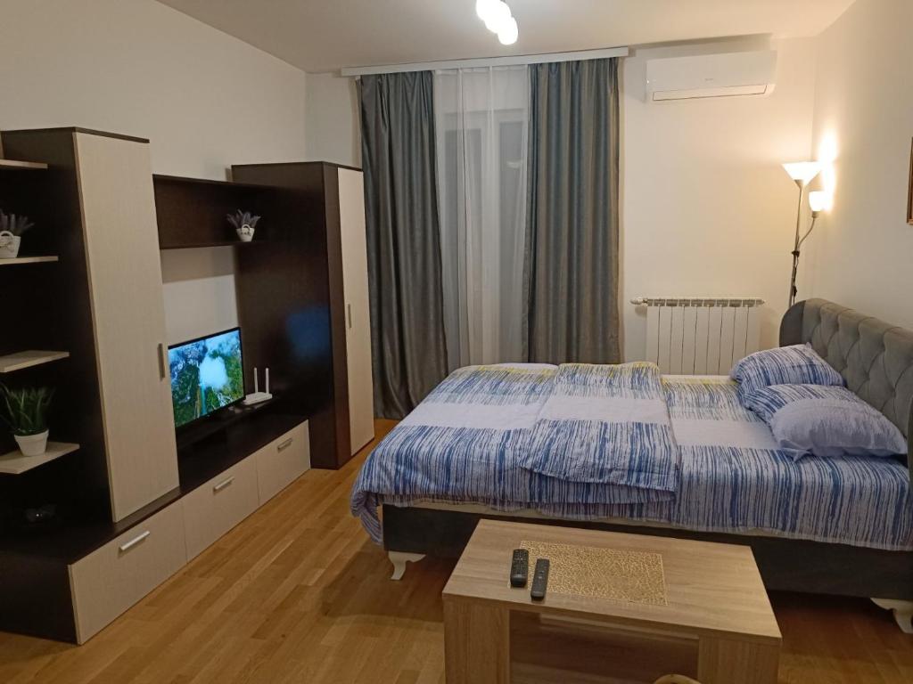 Postel nebo postele na pokoji v ubytování Elite One Premium Apartment