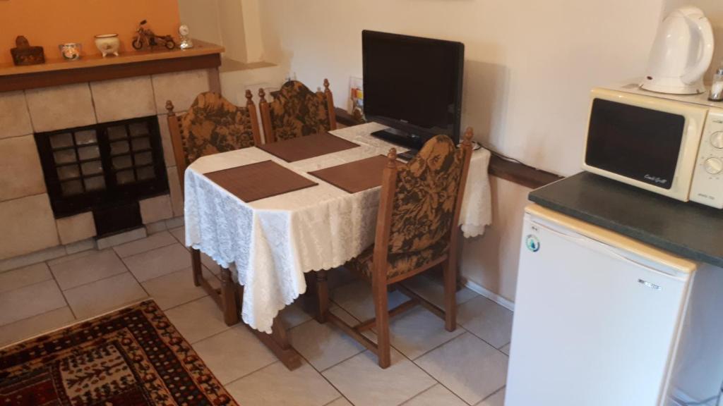 Kuchyň nebo kuchyňský kout v ubytování Chalupa, 3x apartmány, 11 lůžek.