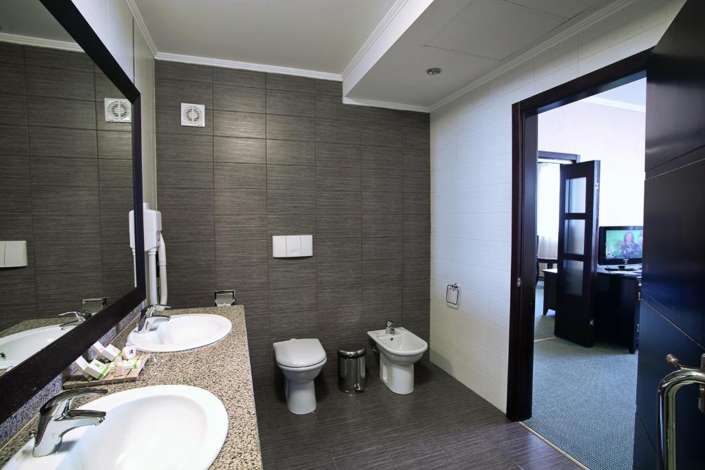 Koupelna v ubytování Hotel Tecadra