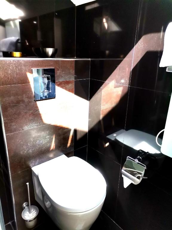 Koupelna v ubytování Lumiere Luxe Suites