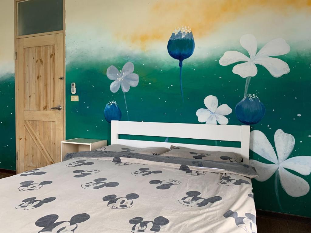 Postel nebo postele na pokoji v ubytování 安禾居 AnHeJu B&B
