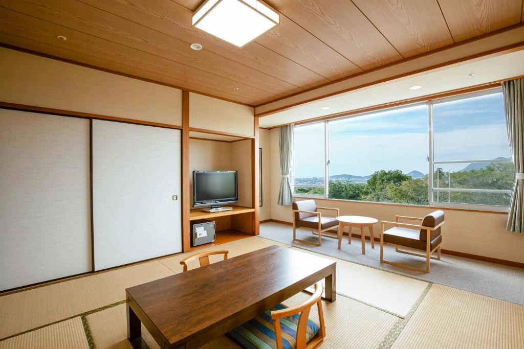 TV a/nebo společenská místnost v ubytování KAMENOI HOTEL Kanonji
