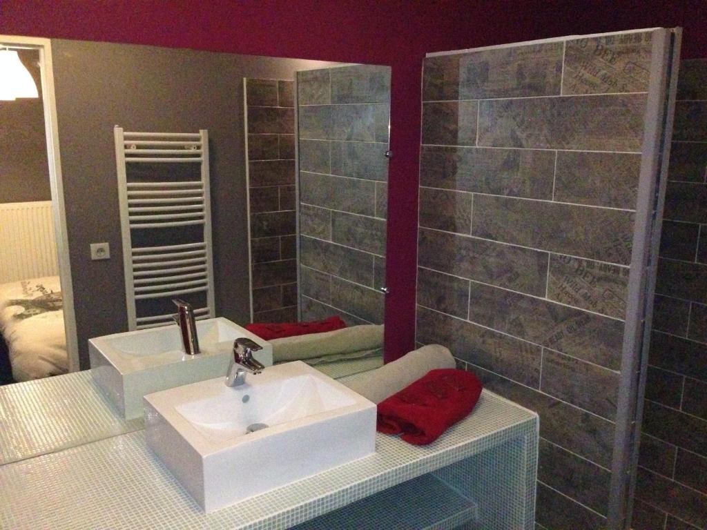 Et badeværelse på Appartements d'hôtes Santa Giulia