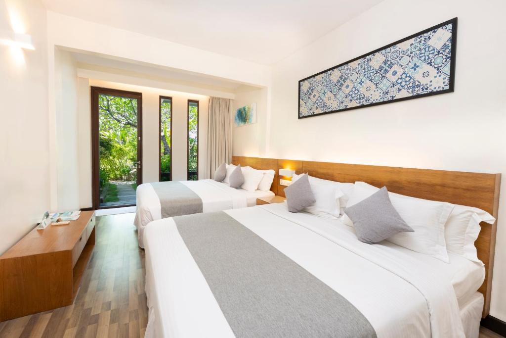 Postel nebo postele na pokoji v ubytování Bubu Resort