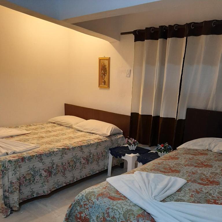 Postel nebo postele na pokoji v ubytování B&B KeisyAlba Punta Rucia