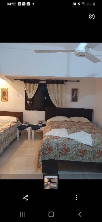 Postel nebo postele na pokoji v ubytování B&B KeisyAlba Punta Rucia