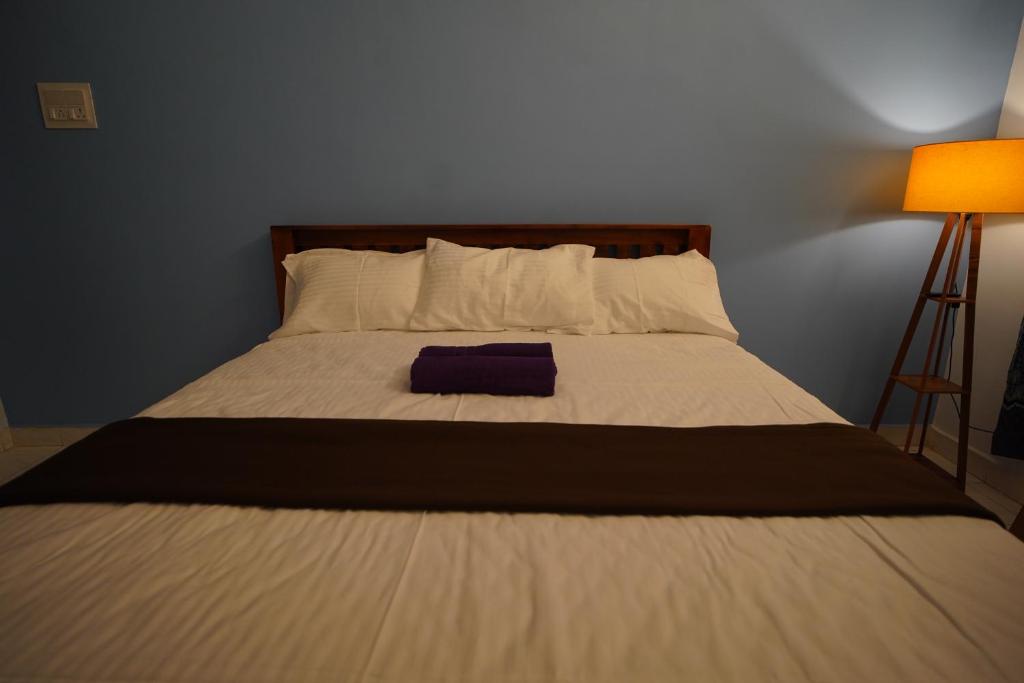 Voodi või voodid majutusasutuse Omkara - The Fives Guest house toas