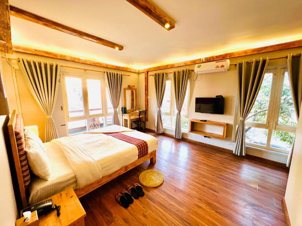 Postel nebo postele na pokoji v ubytování Silu Homes by Hostmandu
