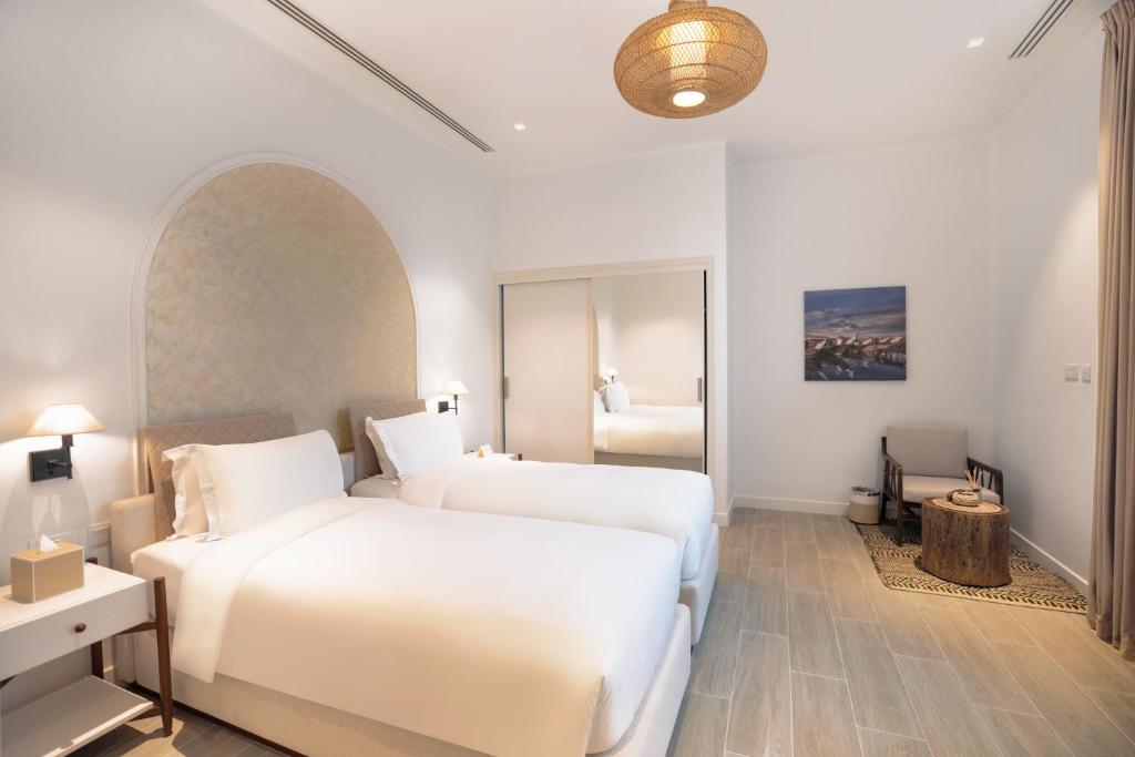 Postelja oz. postelje v sobi nastanitve Mina Hotel and Residences By The Torch