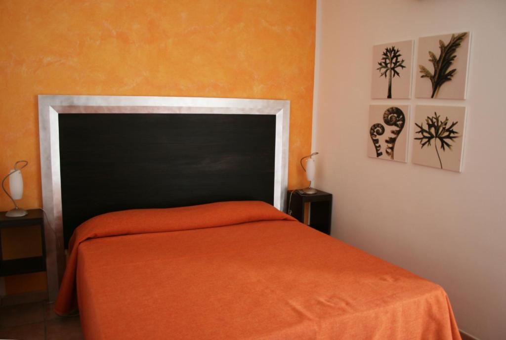 Postel nebo postele na pokoji v ubytování B&B Villa Francesco