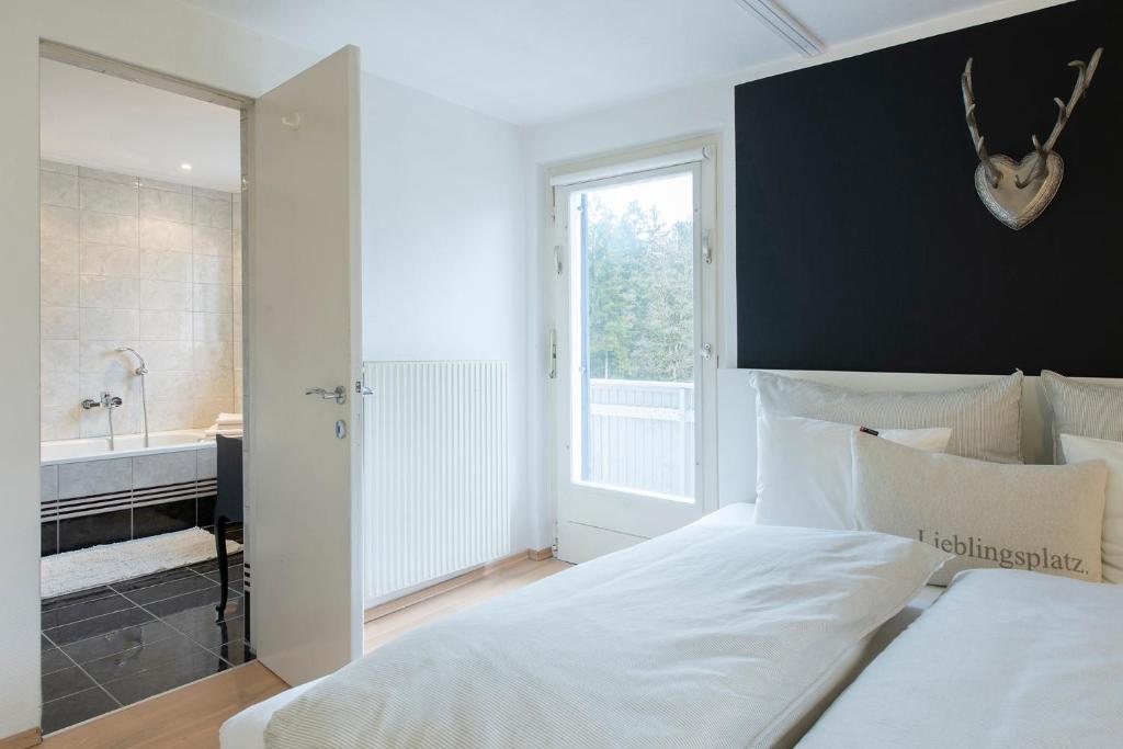 Postel nebo postele na pokoji v ubytování Ferienwohnung Alprima