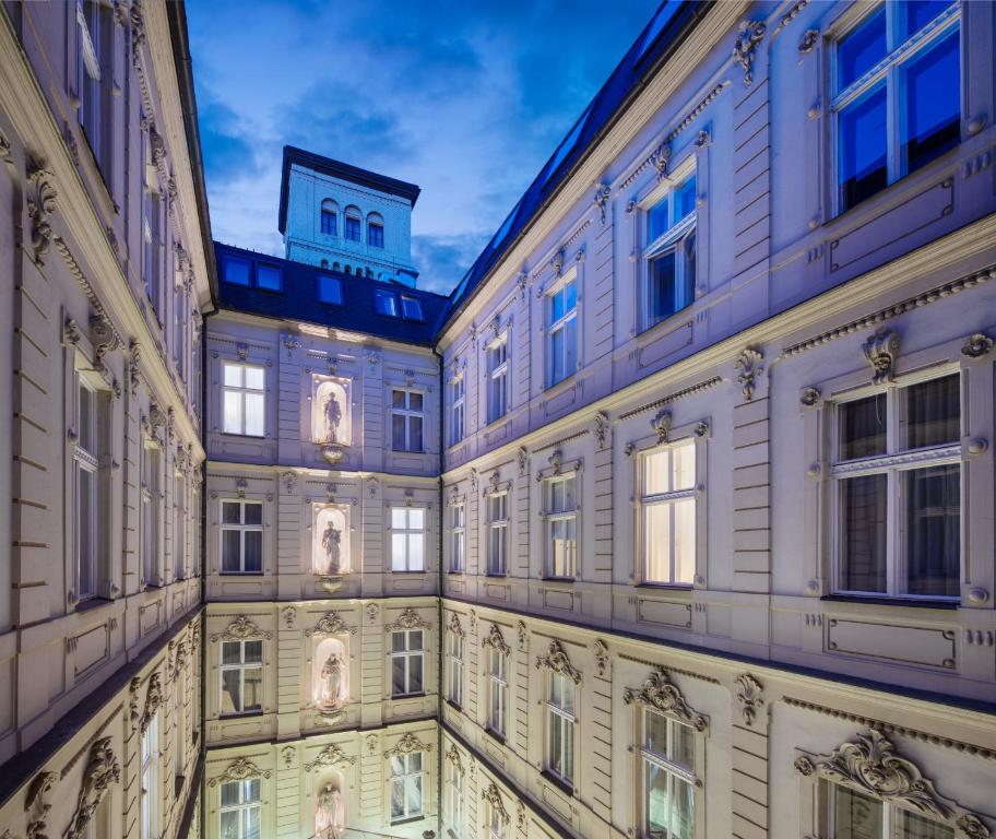 an old building with a tower on top of it at Nemzeti Hotel Budapest - MGallery Collection in Budapest