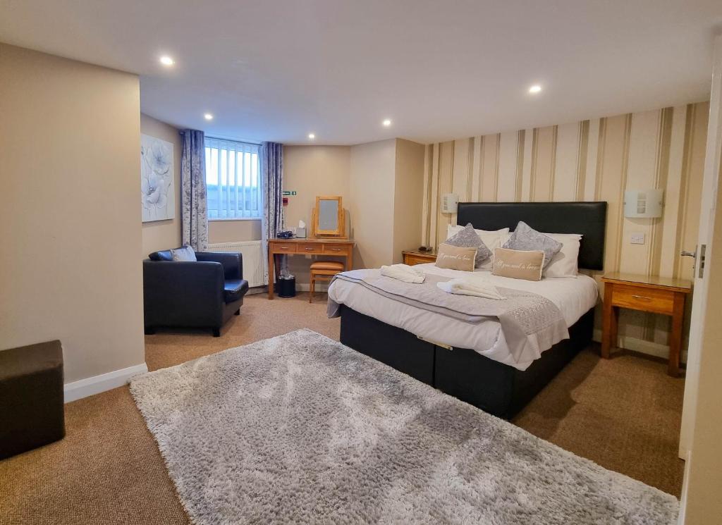 Кровать или кровати в номере The Beach House, Luxury Apartments