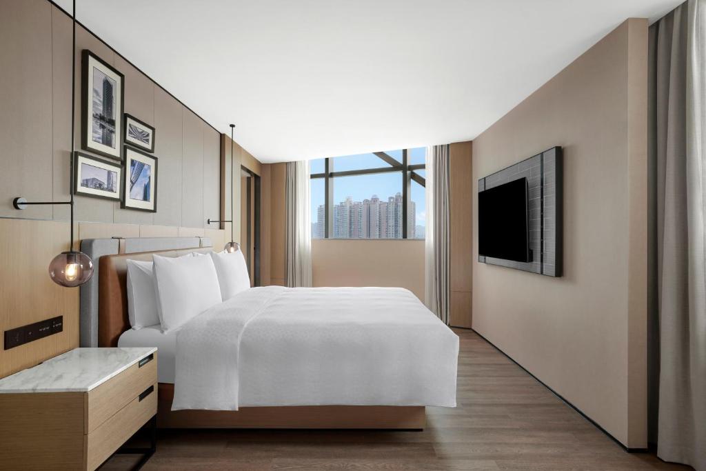 Postel nebo postele na pokoji v ubytování Four Points by Sheraton Shenzhen Bao'an