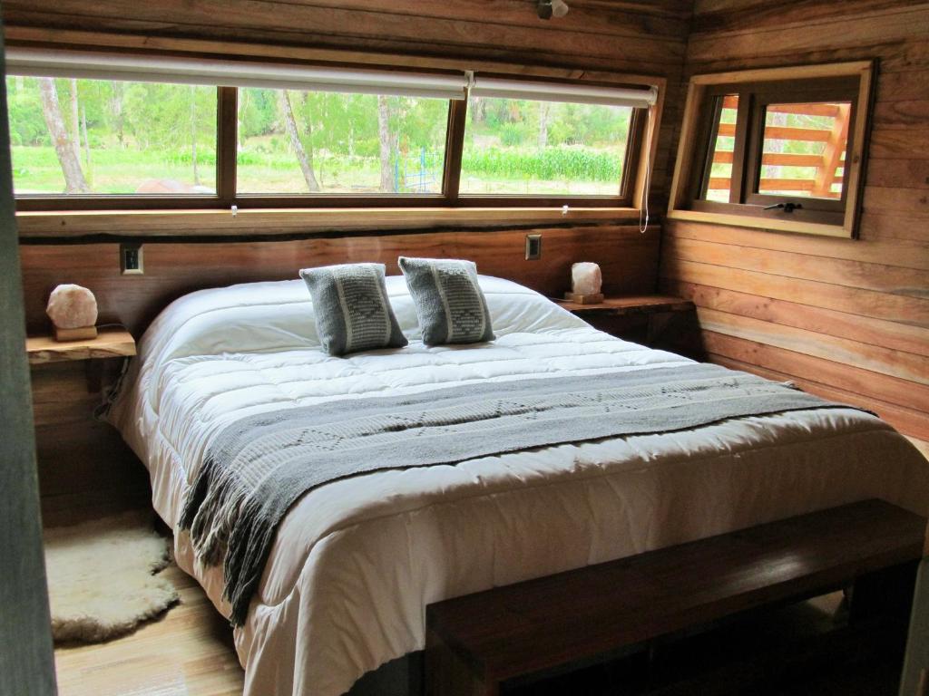 Postel nebo postele na pokoji v ubytování Los Lingues Lodge