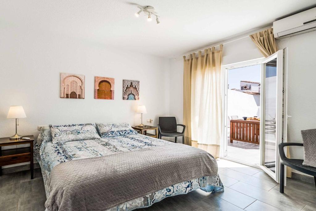 Posteľ alebo postele v izbe v ubytovaní Villa Parador Vistas