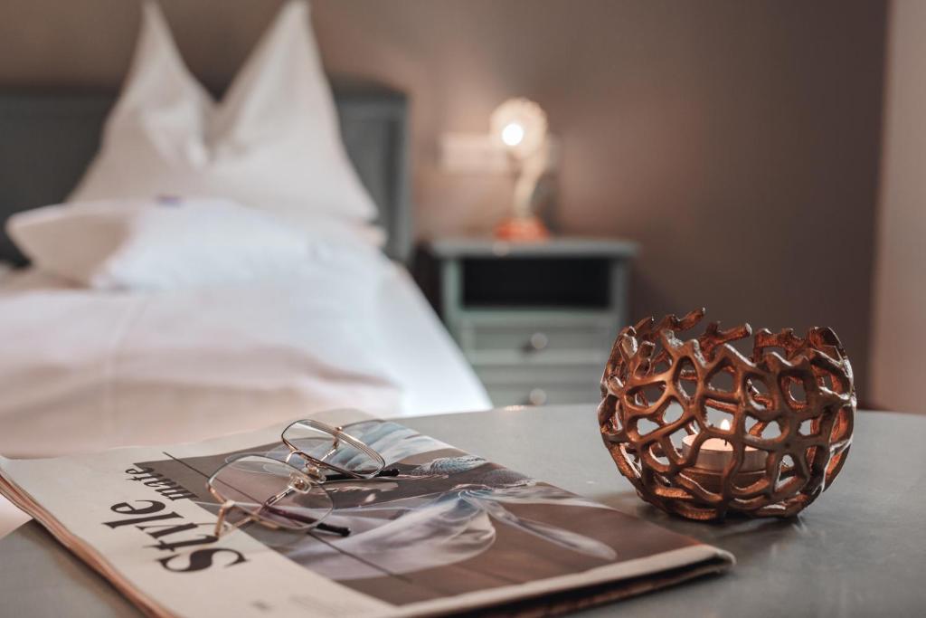 Postel nebo postele na pokoji v ubytování Hotel Rotlechhof