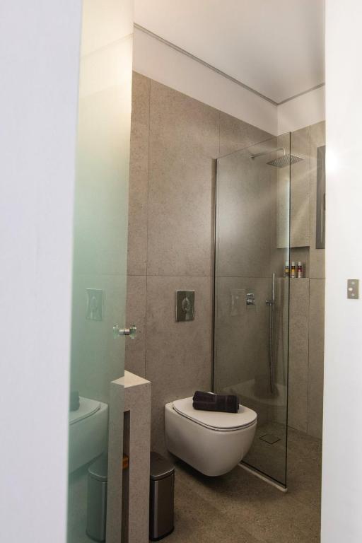 A bathroom at SKYROS BLUE SUITES