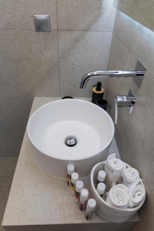 A bathroom at SKYROS BLUE SUITES