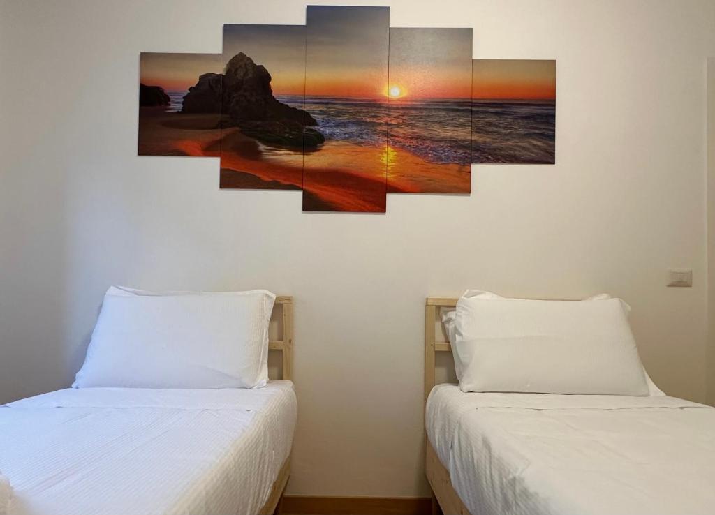 A bed or beds in a room at Eclectic Space Padova two apartments