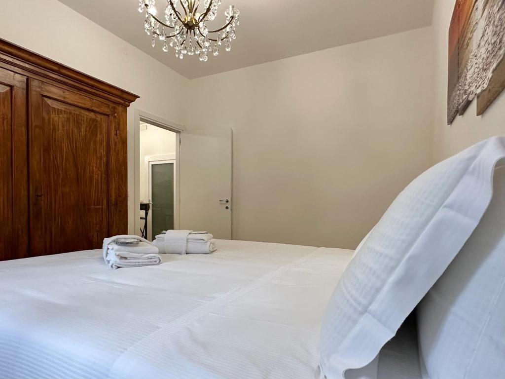 A bed or beds in a room at Eclectic Space Padova two apartments