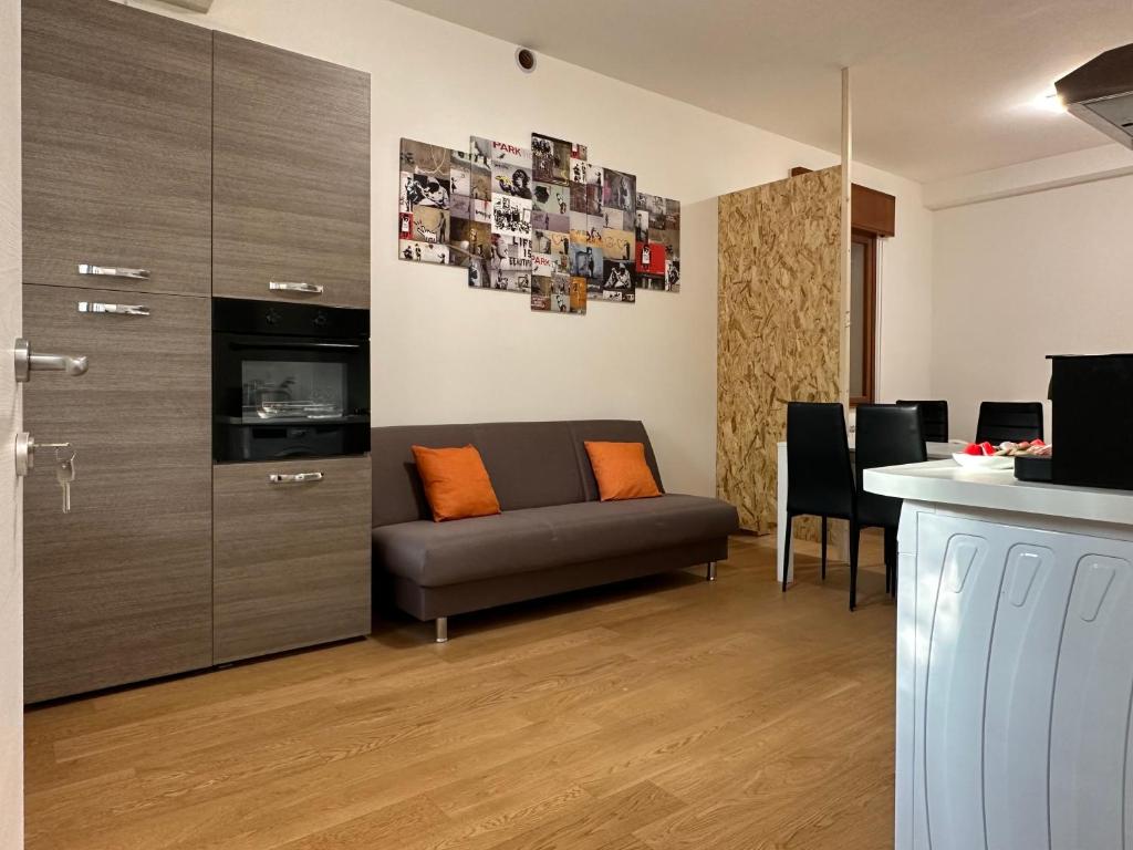 A television and/or entertainment centre at Eclectic Space Padova two apartments