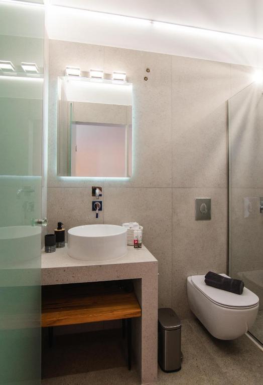 A bathroom at SKYROS BLUE SUITES