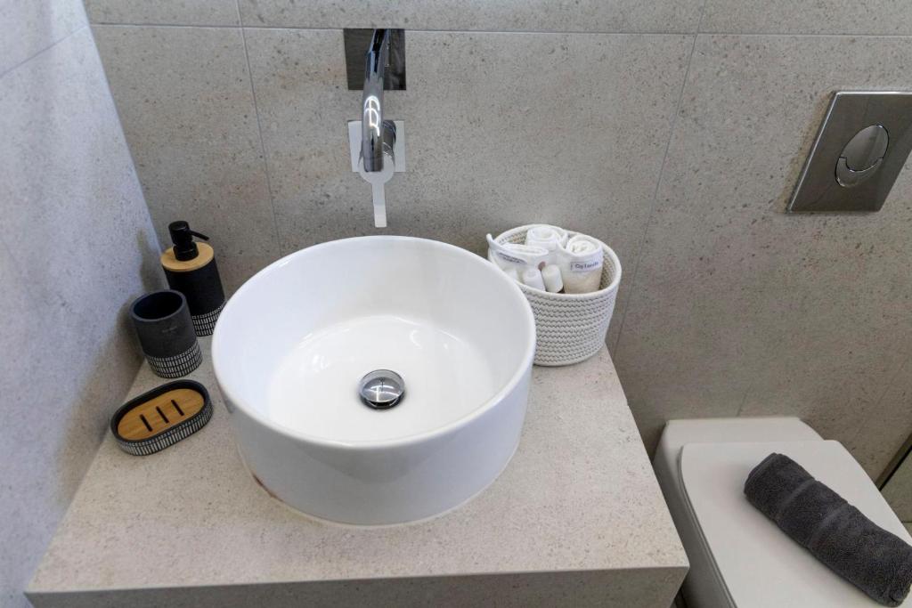 A bathroom at SKYROS BLUE SUITES