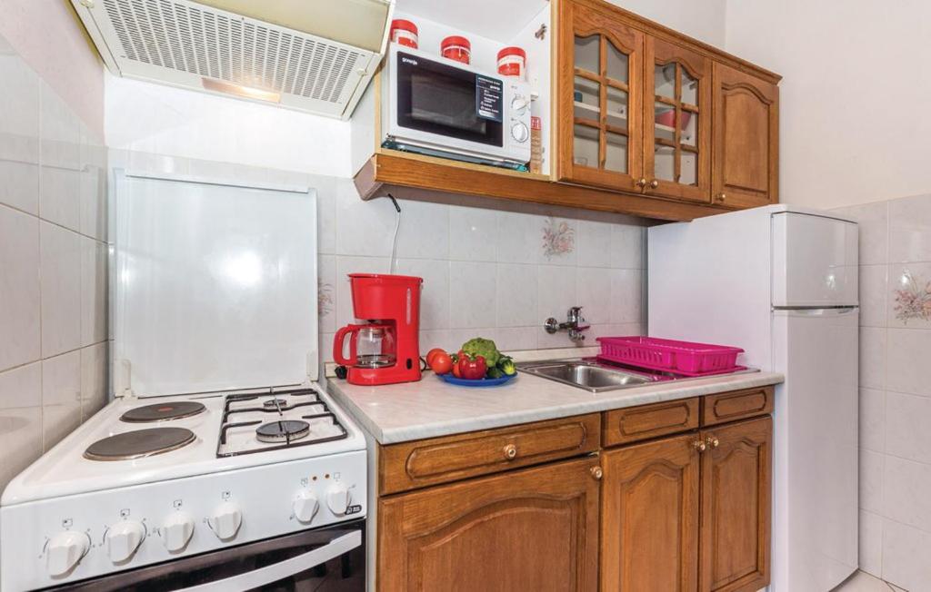 Kuchyňa alebo kuchynka v ubytovaní House Antoine