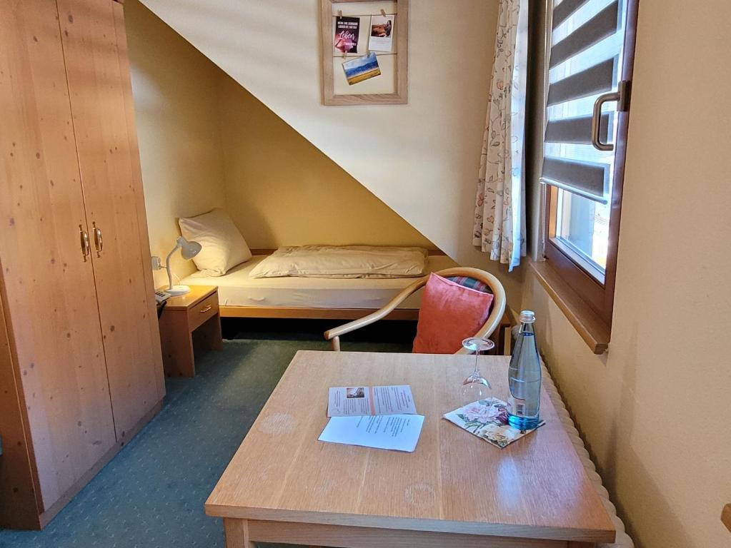 Postel nebo postele na pokoji v ubytování Hotel Obergfell